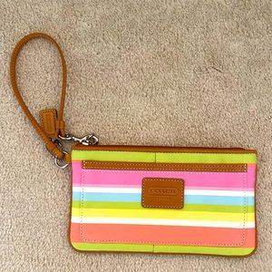 Coach multi color striped wristlet